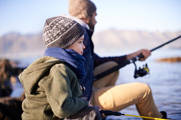 Water, father and son fishing in nature, outdoor and dad teaching boy in lake for bonding together. Parent, male person and man with kid for adventure in seaside, happiness and smile of child