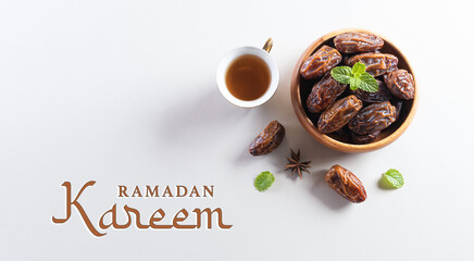 Table top view image of decoration Ramadan Kareem background,  dates fruit and coffee. Flat lay background with copy space.