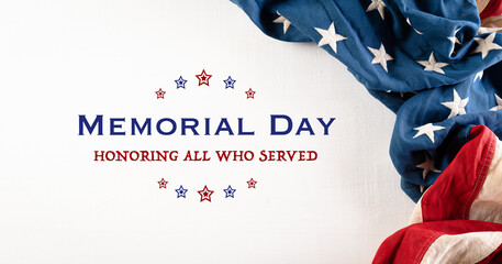 Happy memorial day concept made from american flag and the text on white wooden background.