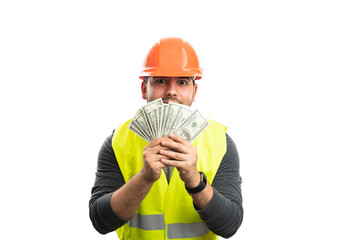 Cheerful builder man presenting cash money as payment concept
