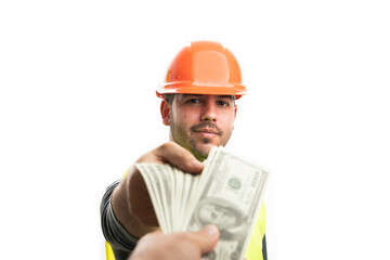 Builder man with happy expression receiving cash money