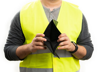 Close-up of empty wallet held by builder wearing yellow vest