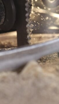 Explore the elegance of woodworking craftsmanship as our vertical 4K slow motion video showcases the graceful motion of a jigsaw cutting through wood with expert precision. Perfect for emphasizing the