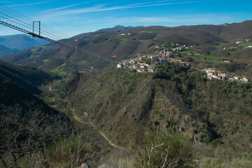 Beautiful view of Vigi valley with the famous tibetan bridge of Sellano in Umbria region, Italy - 763993207