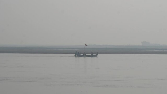 The travle boat in the sea.  People enjoying a ride on a boat. Fishing boats floating on the sea. Fishermans in boat. fishing boat sailing in open waters. man fishing on boat. Slow Motion