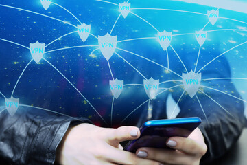 Mobile VPN software, hand holding phone, safe internet browsing,Element of the image provided by...