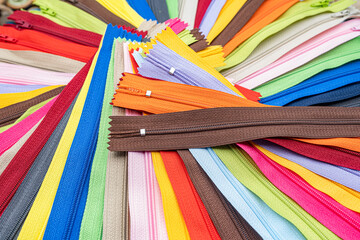 Multicolored Zippers or Zip Fasteners used for binding fabric or textile