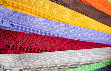 Multicolored Zippers or Zip Fasteners used for binding fabric or textile