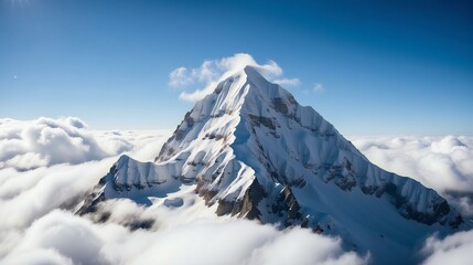 Fototapeta na wymiar Summit Above the Clouds: Snow-Capped Majesty Under Clear Skies