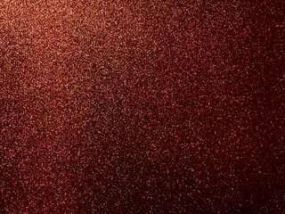 Red glitter background differently illuminated from top to bottom