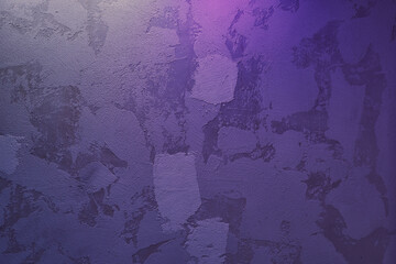 Beautiful abstract texture decorative wall colored in very peri, violet, grungy stucco with gradient. Background with copy space. Concept of decor, design, wallpaper.