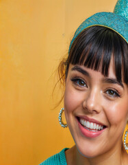 A woman looking at the camera while preparing for a party with a yellow wall background