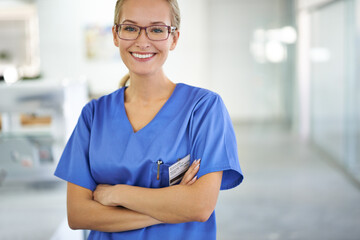 Happy woman, portrait and professional nurse with arms crossed at laboratory for healthcare or science. Young female person or medical researcher in confidence for PHD or career ambition at the lab