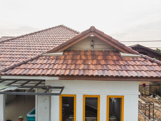 Aerial view modern house roof top building brown brick roof