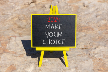 2024 Make your choice symbol. Concept words 2024 Make your choice on beautiful black chalk blackboard. Beautiful stone background. Business 2024 Make your choice concept. Copy space