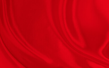 Black red satin dark fabric texture luxurious shiny that is abstract silk cloth background with patterns soft waves blur beautiful.