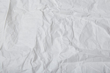 Rustic background of crinkled white paper and copy space