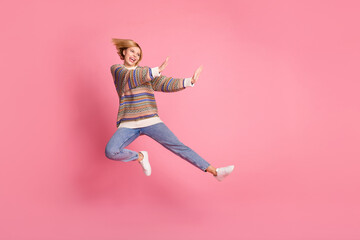 Fototapeta na wymiar Full length photo of dangerous girl dressed print sweater fly look empty space at fight club logo isolated on pink color background