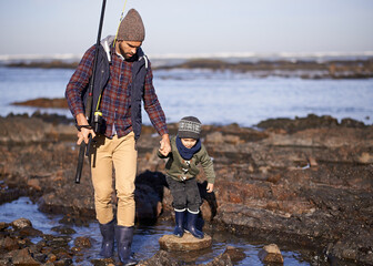 Man, kid and fishing at sea in winter as hobby with bonding for child development, growth and life...