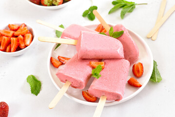 Strawberry ice cream popsicles