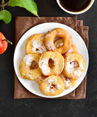 Apple rings on white plate