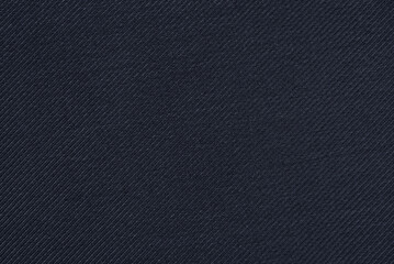 Dark blue cotton twill fabric pattern close up as background