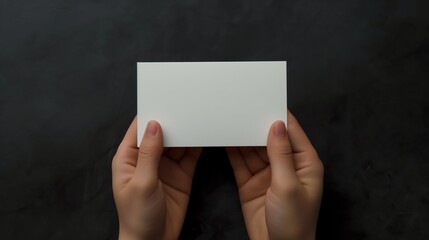 person holding blank business card