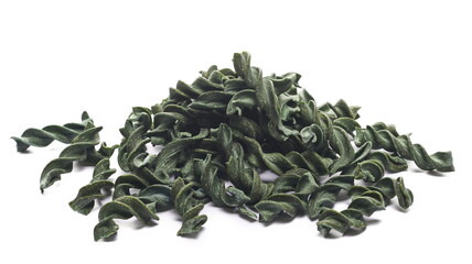Uncooked fusilli spirulina pile, organic dry pasta isolated on white, side view - 764075868
