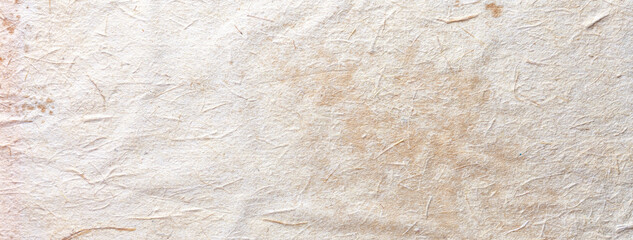 Texture of beige old paper, crumpled background. Vintage white surface backdrop.