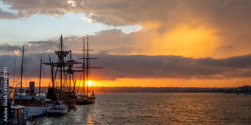 Poster Historic sailing ships in San Diego maritime museum at sunset, California