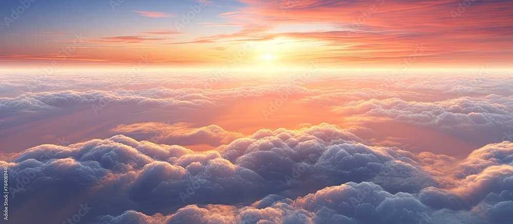 Poster a stunning view of the sun setting over a sky filled with fluffy clouds, creating a vibrant and colo