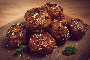 Tsukune, Japanese meatballs, minced chicken, fried on a skewer, with yakitori sauce, homemade, no people,