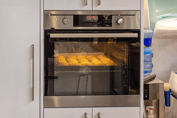 Baking Croissants at Tray in Electric Oven Home Cooking