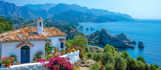 Foto auf Acrylglas Mittelmeereuropa house on the cliff near the mediterranean sea