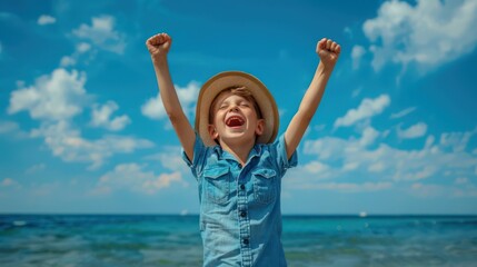 A child with arms raised in victory stands by the sea, wearing a straw hat and blue shirt, embodying freedom and joy
