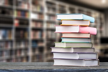 Book stack on the desk in public library