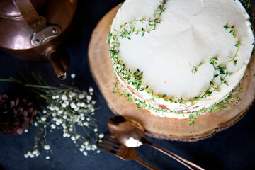 Buttercream cake decorated with thyme - obrazy, fototapety, plakaty