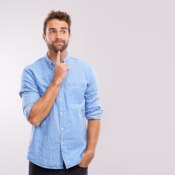 Thinking, planning and man in studio with why, questions or brainstorming solution on white background. Idea, doubt and curious male model with problem solving memory, remember or reflection gesture
