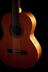 Classical Spanish flamenco guitar close up, dramatically lit isolated on black background with copy space.