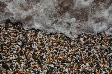 Sea rocks and wave close-up, sea shore