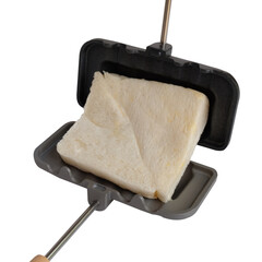 Decorative portable toaster or sandwich pan camping on white background.