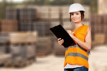 A storage worker preparing  goods on shelves.