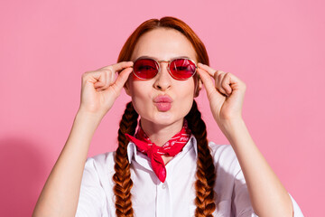 Photo of tricky flirty lady dressed cowboy outfit arms dark red eyewear sending you kiss isolated pink color background - obrazy, fototapety, plakaty