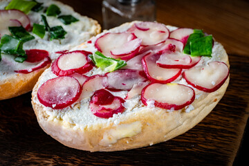Sandwich with cheese, radish and chives.
