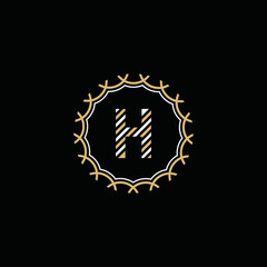 Golden and white vector frame with letter H
