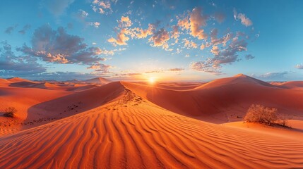Desert landscape at sunset, sand dunes and colorful clouds on sky