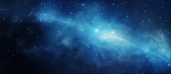 An illustration of a celestial blue galaxy filled with twinkling stars and a luminous light shining prominently at its center