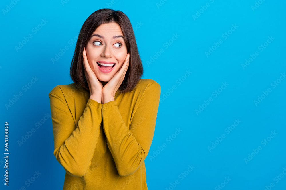 Canvas Prints Photo of dreamy pretty lady dressed shirt arms cheeks looking empty space isolated blue color background