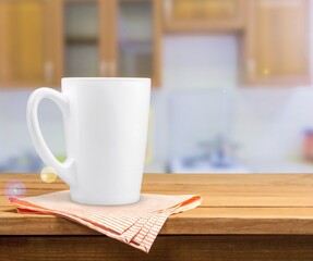 A Blank Mug cup white color on the desk