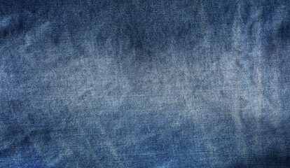 Close-up of blue denim jeans fabric texture background - 764200440
